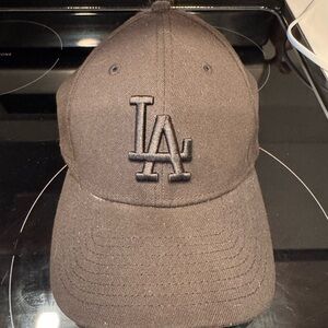 New Era Black Cap with Genuine Merchandise Logo